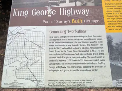 A weathered heritage panel headed King George Highway, Part of Surrey’s Built Heritage, with a section titled Connecting Two Nations beside a hand-drawn 1940 map of the highway’s route.